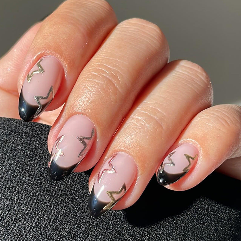 Acrylic nail set with elegant French tip design and glamorous accents Kalsten