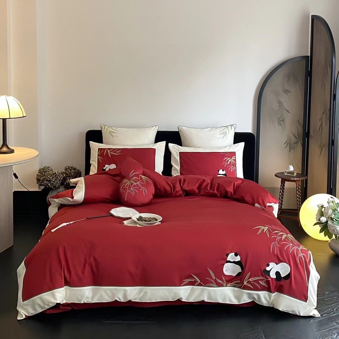 Duvet cover set made of cotton satin with applied animal embroidery and contrasting hem edge