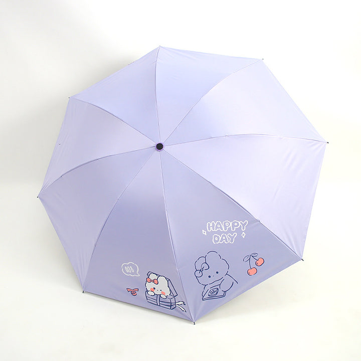 Ladies folding umbrella with playful design and cheerful Kalsten motif