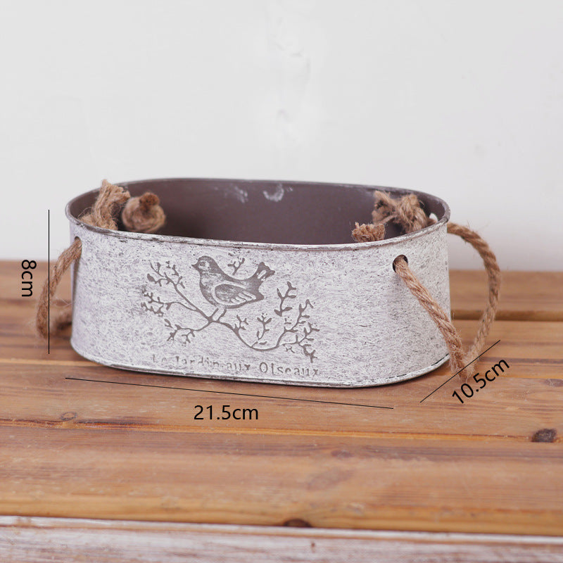 Decorative storage basket made of metal with natural design Kalsten