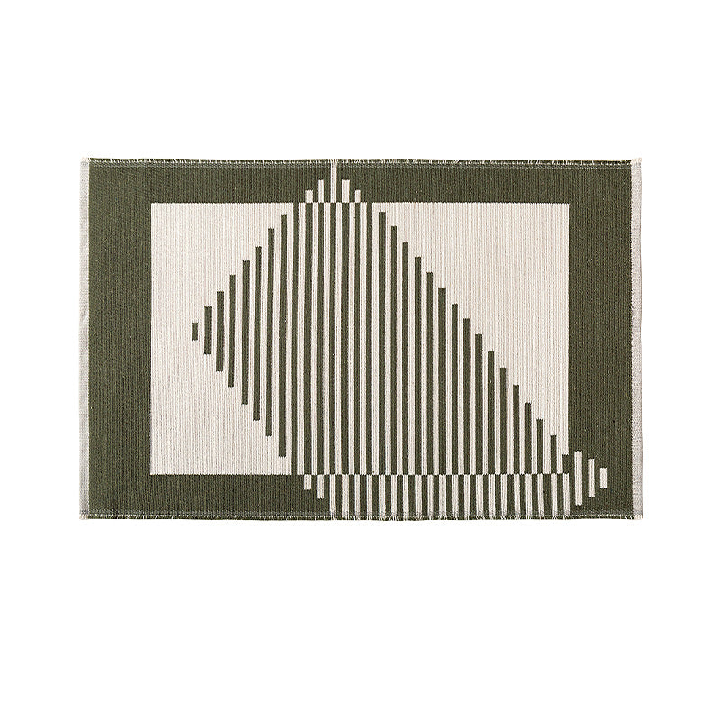 Flat-woven living room rug in a graphic tile pattern