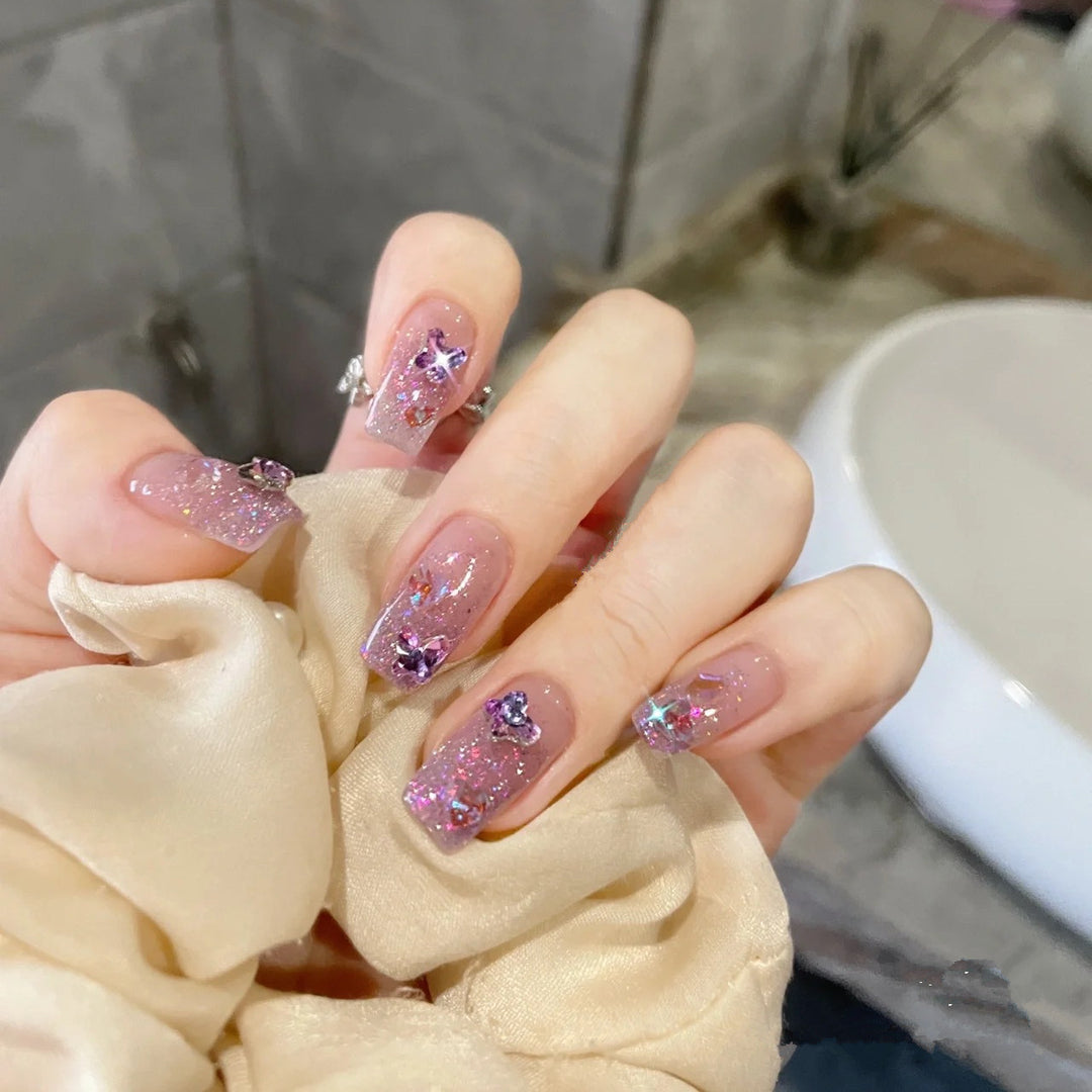 Glamorous artificial nails with sparkling accents Kalsten
