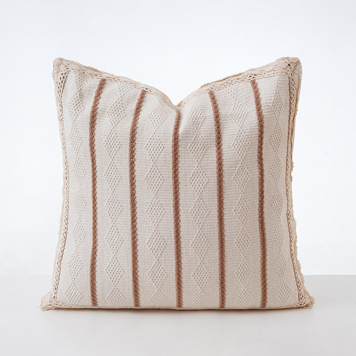 Structured square decorative pillow with crocheted trim and striped knit texture