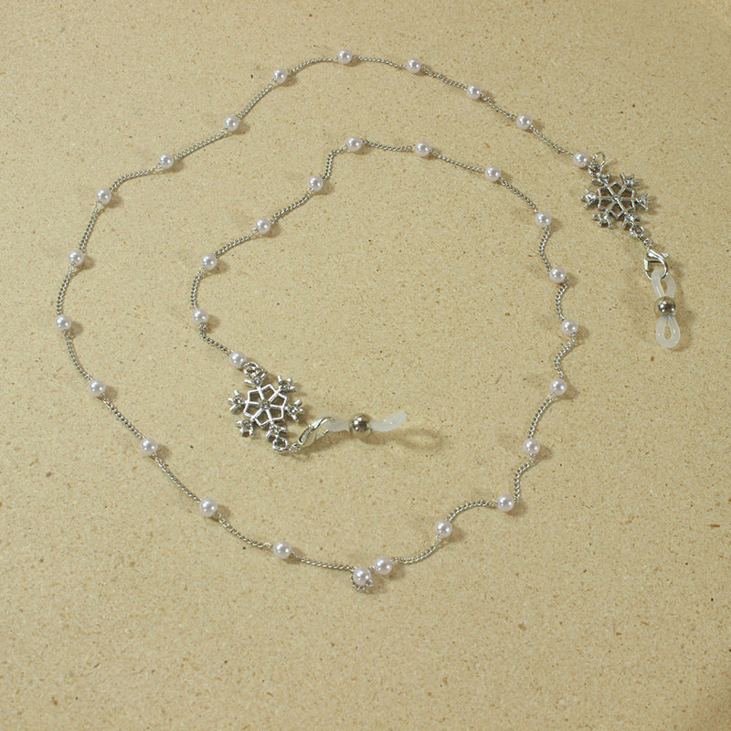 Elegant glasses holder chain with pearls and snowflake pendant Kalsten