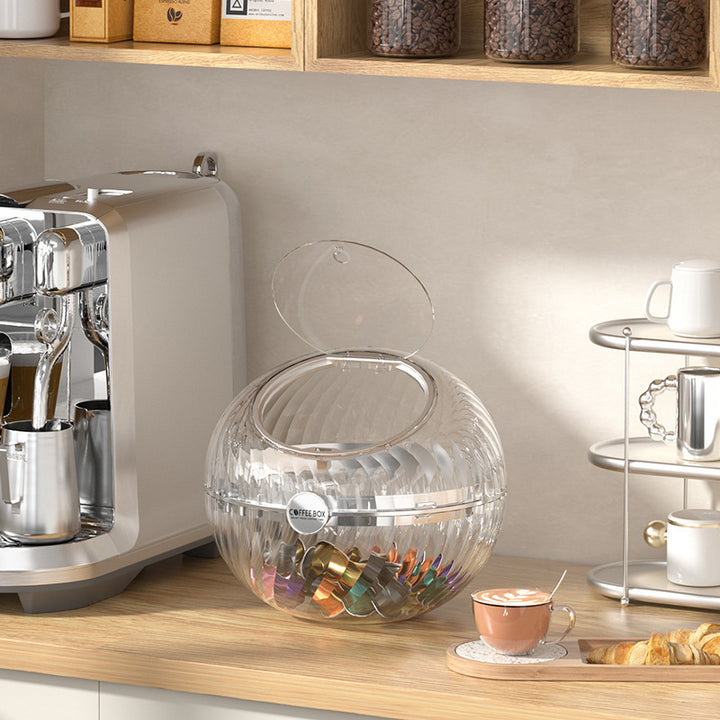 Spherical coffee capsule dispenser made of clear acrylic with flip lid
