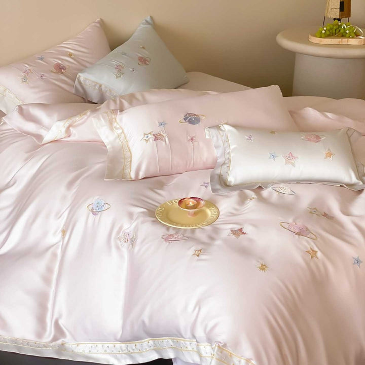 Satin bedding set with embroidered galaxy motif and silky smooth finish