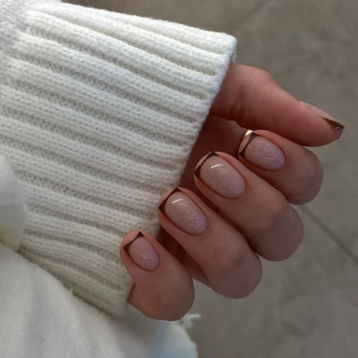 Artful nail design with elegant French tip and glossy finish Kalsten