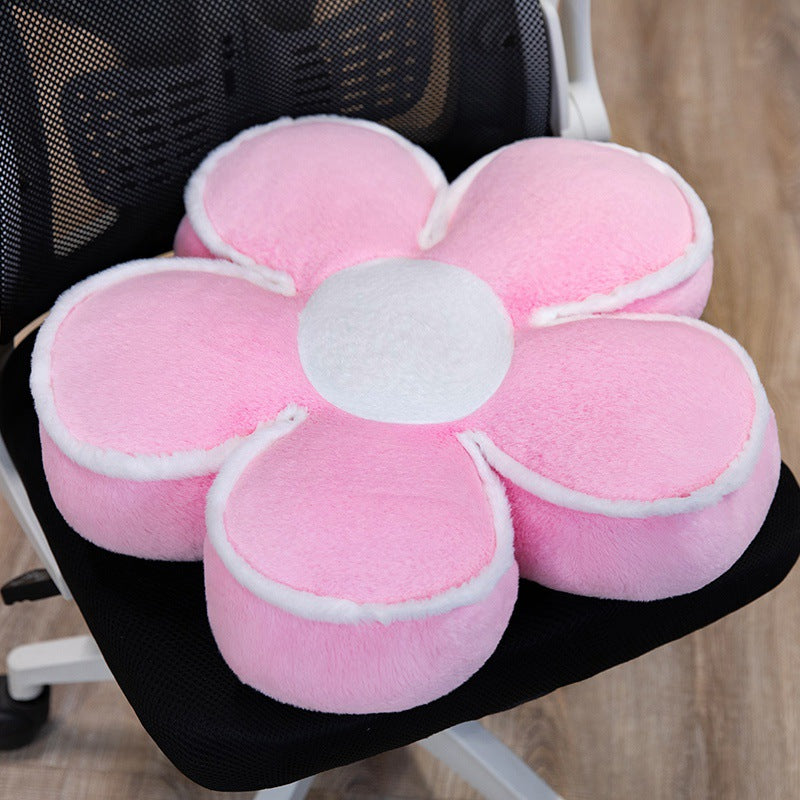 Padded seat cushion in flower shape with faux leather center piece and fluffy edge padding