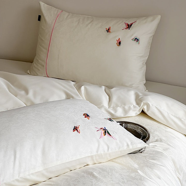 Satin-Jacquard bedding set with embroidered butterfly details