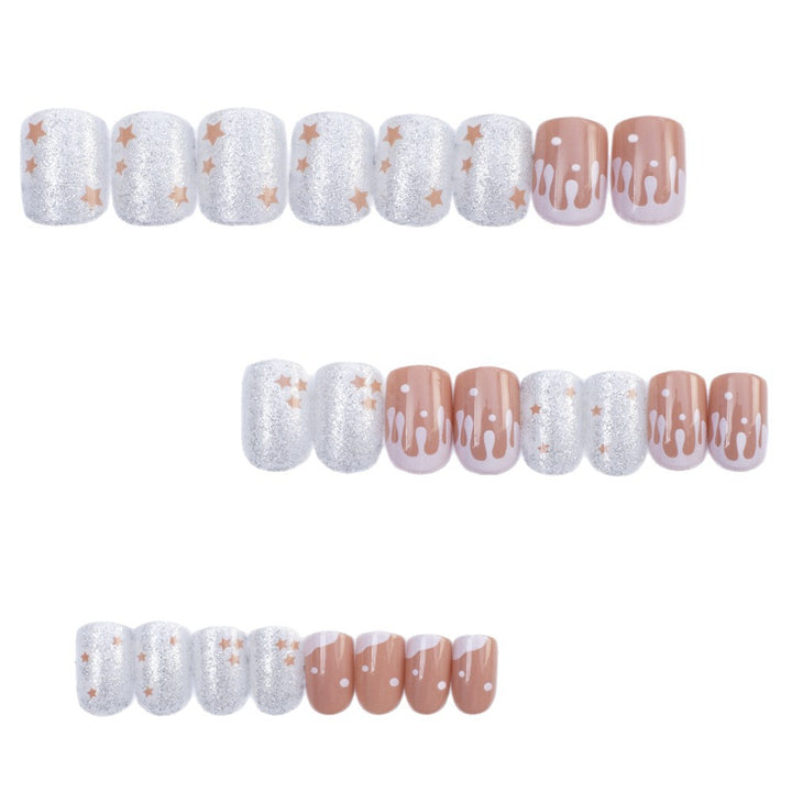 Glittering artificial nails with playful drop design Kalsten