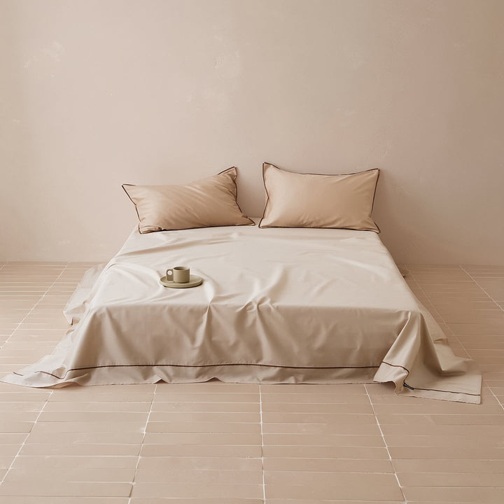 Noble cotton satin bed sheet and pillowcase set with fine piping