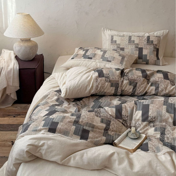 Modern patchwork bedding set in linen look with reversible design