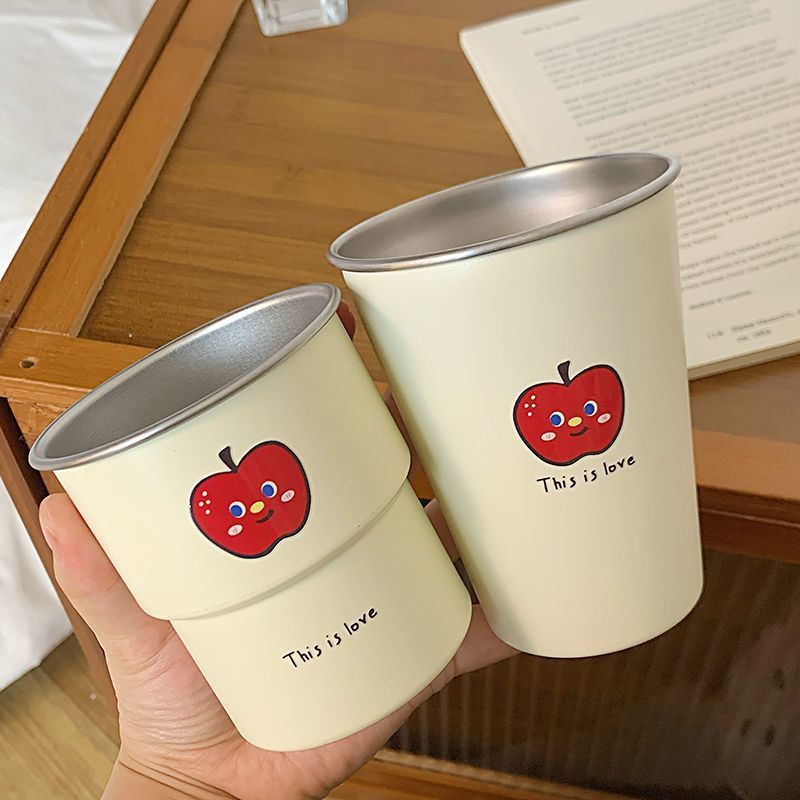 Multifunctional ceramic mug with cheerful apple design Kalsten