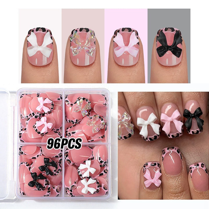 Artificial nail set with impressive floral and bow accents Kalsten