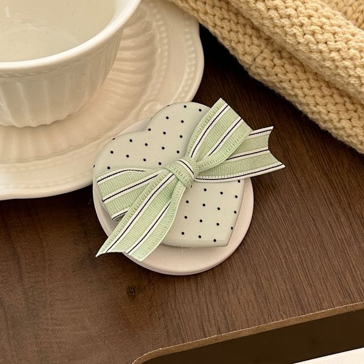 Heart-shaped cosmetic box with bow motif Kalsten