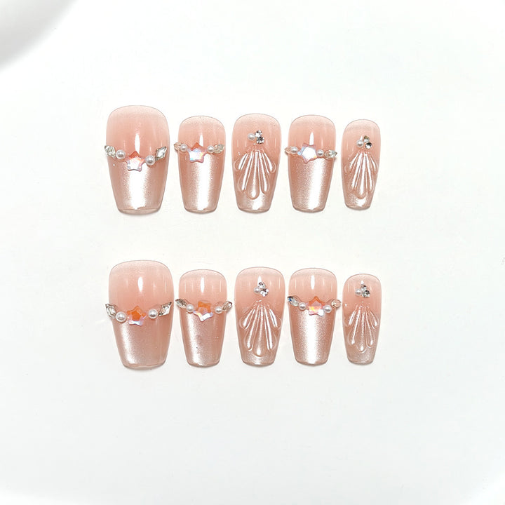 Elegant artificial nails with pearl and rhinestone embellishments Kalsten