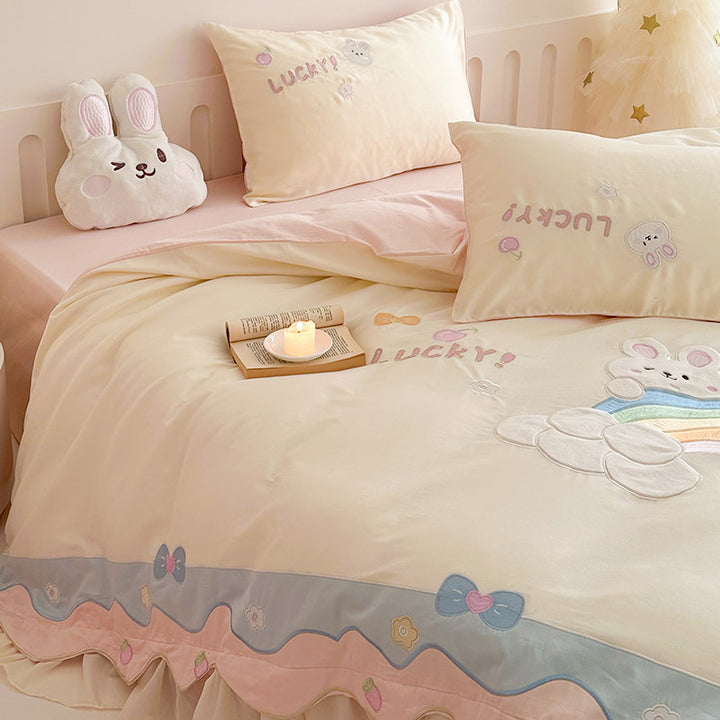 Playful cotton bedding set with appliqués and ruffles