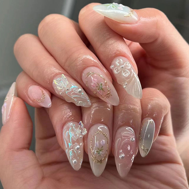 Artful nail extensions with elegant flower decoration Kalsten