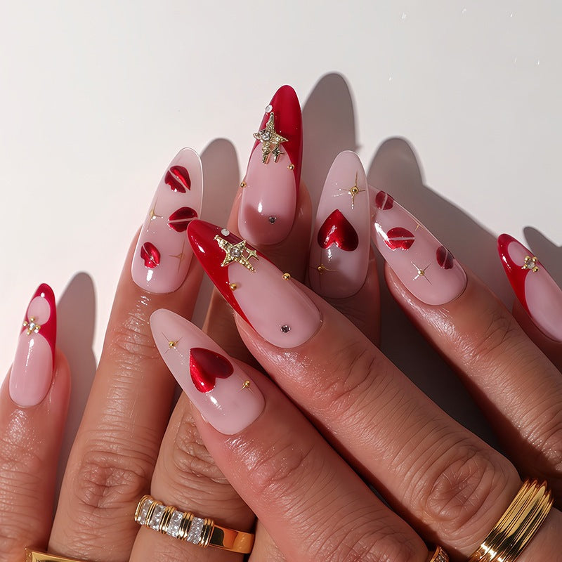 Artificial nail set with romantic heart designs and glamorous 3D details Kalsten