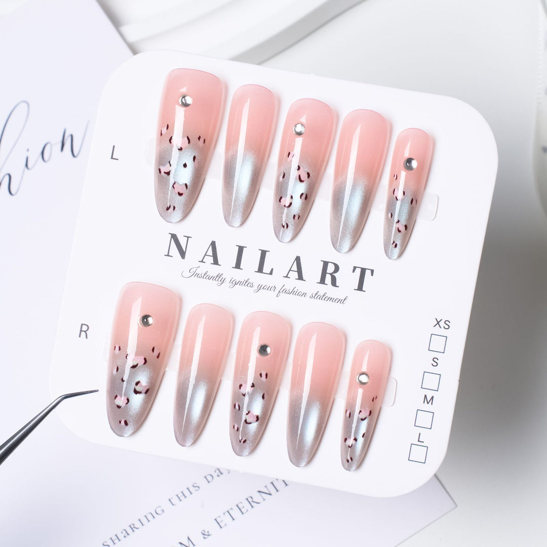 Artistic Press-On Nail Design with Floral Accents Kalsten