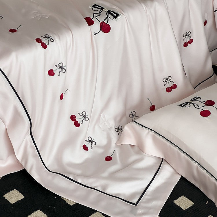 Cotton satin bedding set with cherry embroidery and contrasting piping