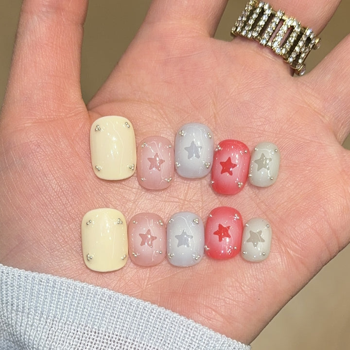 Artificial nails with sparkling star motifs Kalsten
