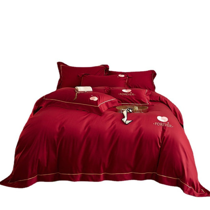 Premium cotton satin bedding set with gold piping and heart embroidery