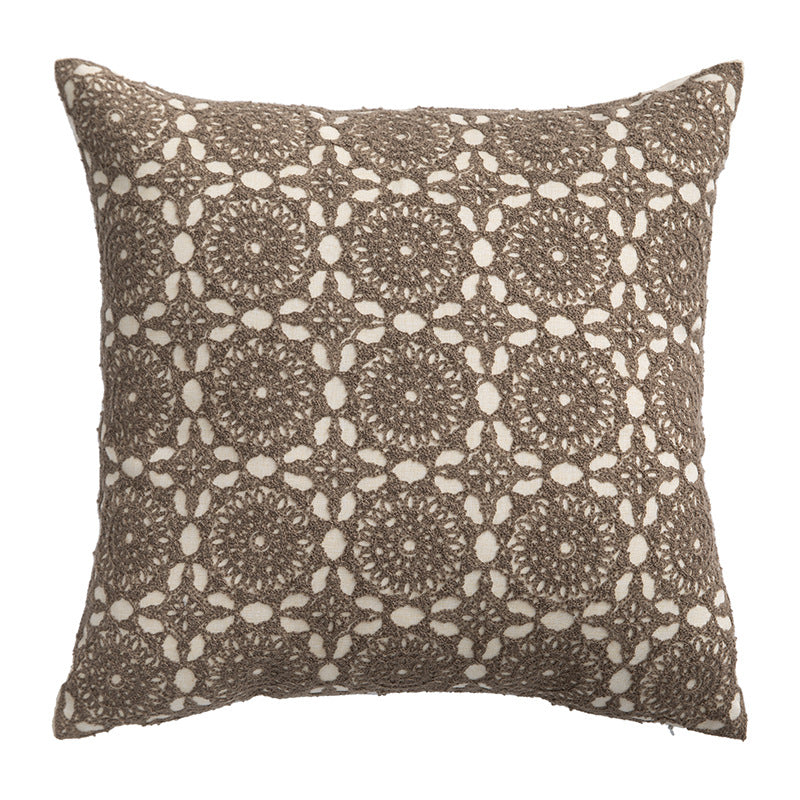 Square decorative cushion with crocheted ornament overlay and linen texture