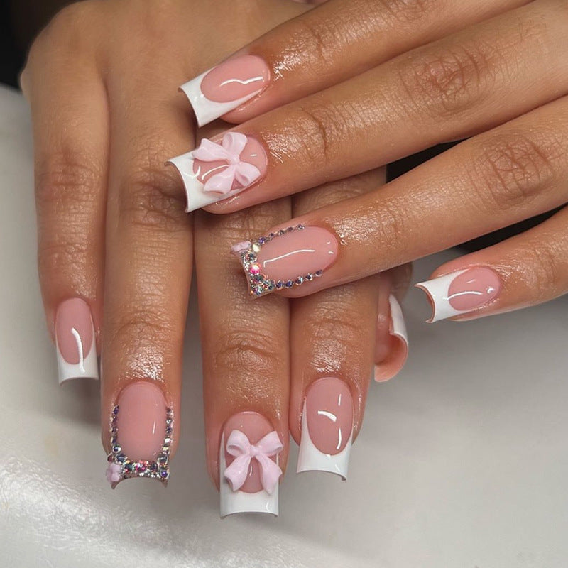 Artificial nail set with elegant bow and glitter designs Kalsten