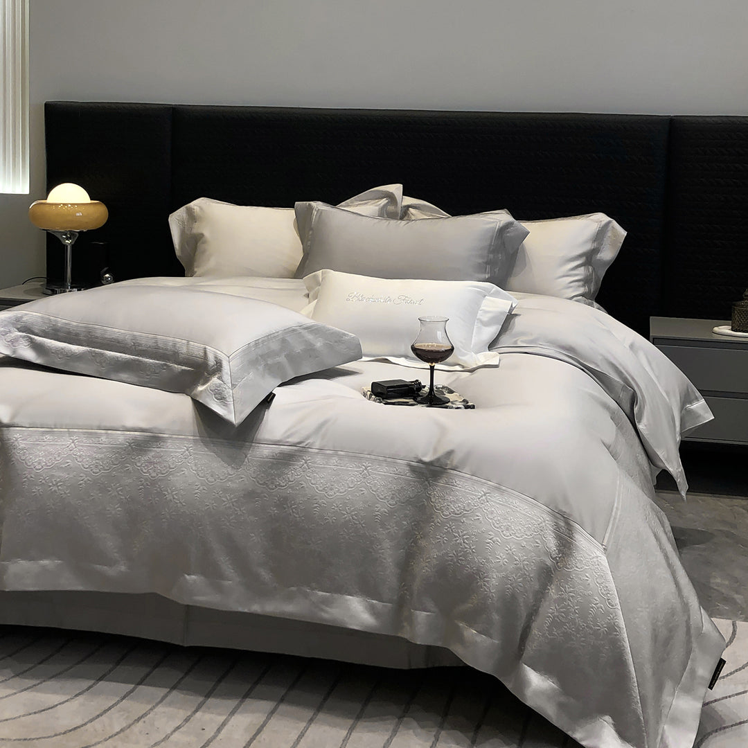 Premium cotton satin bedding set with structured matelassé border and hotel closure