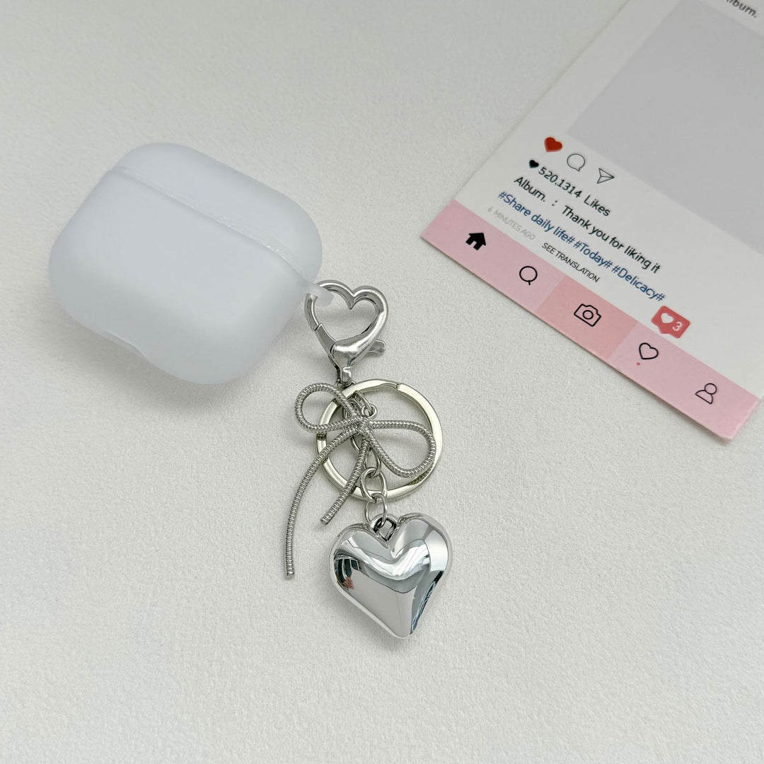 Heart-Shaped Metallic Keychain with Decorative Bow Kalsten