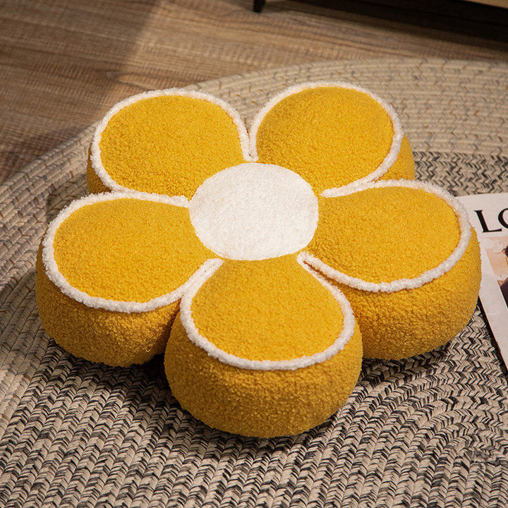 Padded seat cushion in flower shape with faux leather center piece and fluffy edge padding