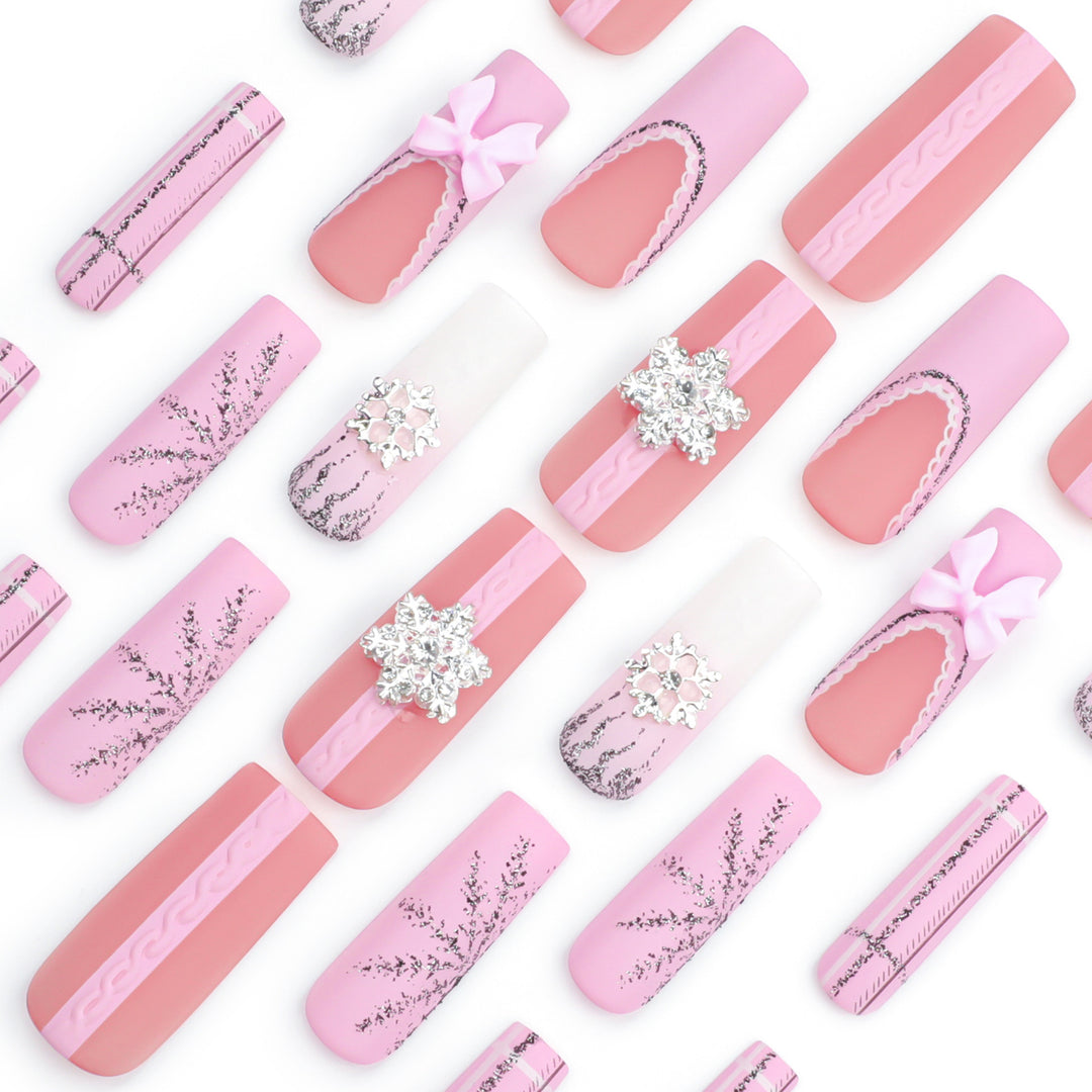 Artful nail extensions with festive decorations Kalsten