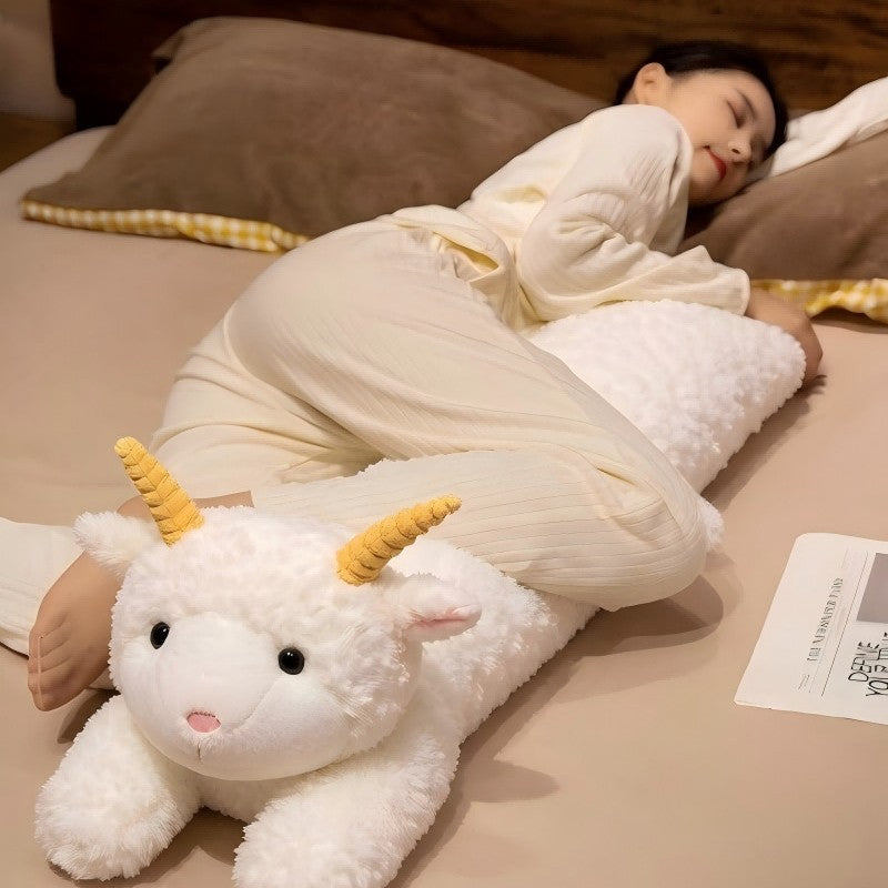 Cuddle roll pillow in sheep look with decorative horns