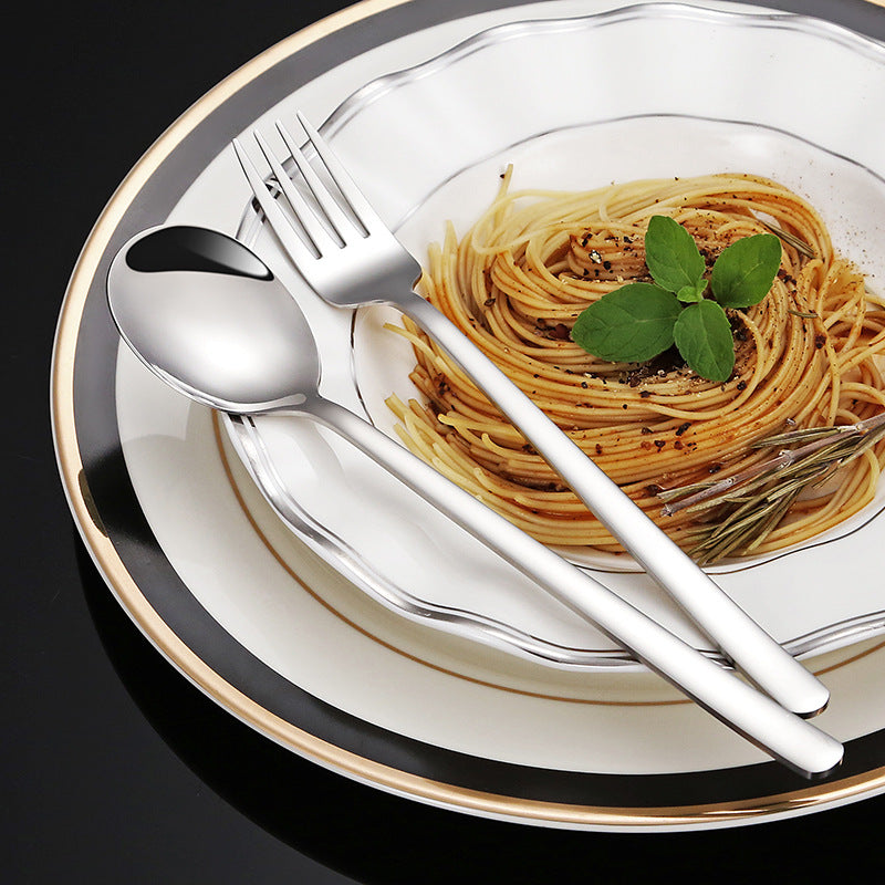 Elegant dessert spoon with luxurious golden surface Kalsten