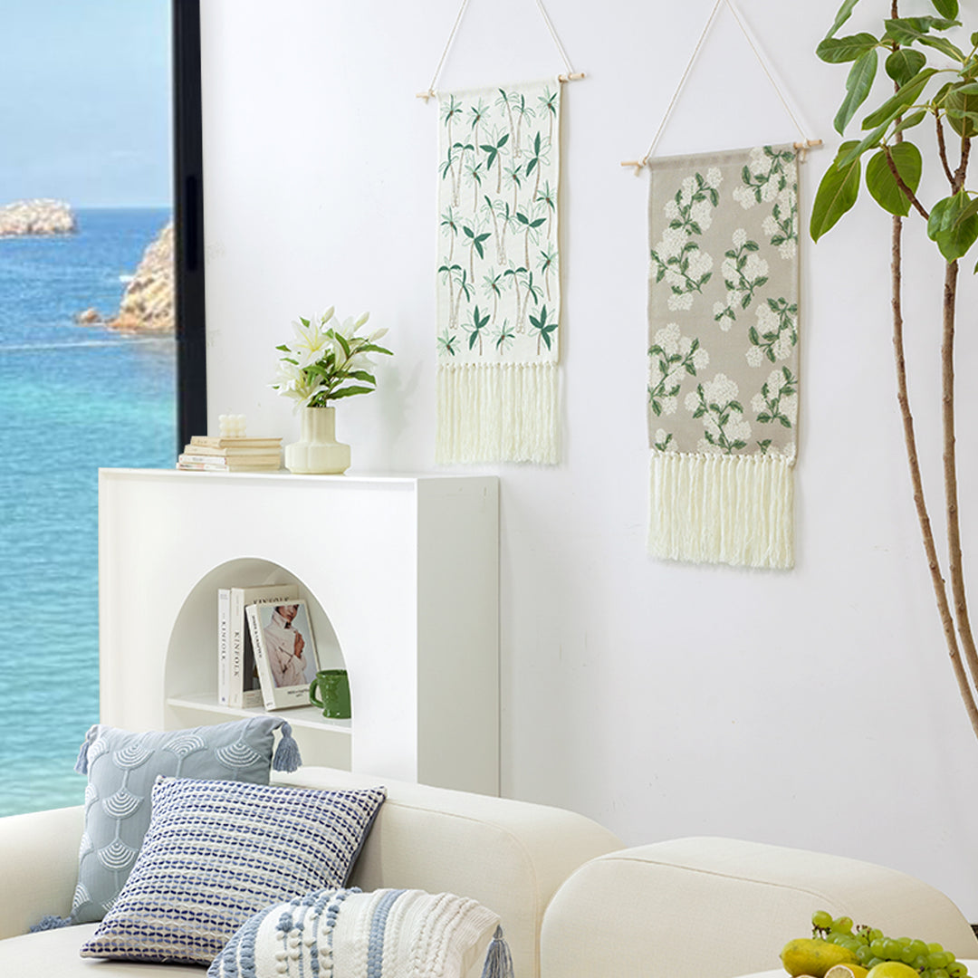 Woven wall tapestry with hydrangea pattern and long fringes