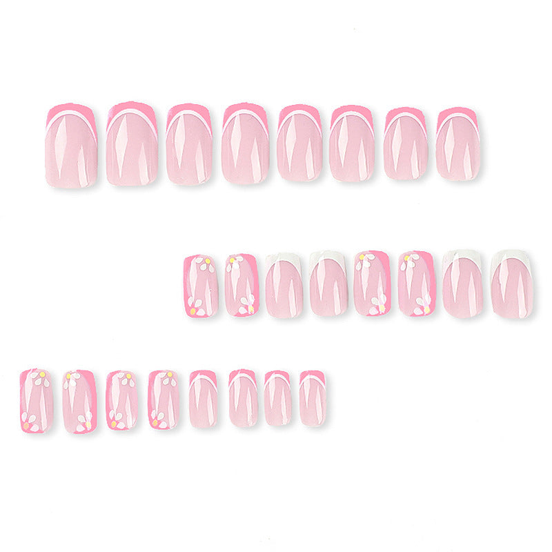 Artistic nail art with floral design and glitter accents Kalsten