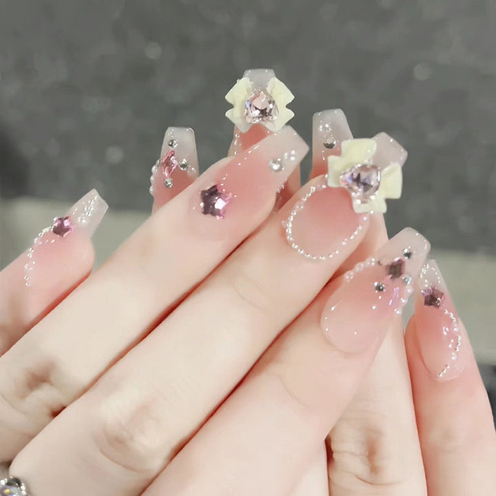 Artificial nails with floral accents Kalsten