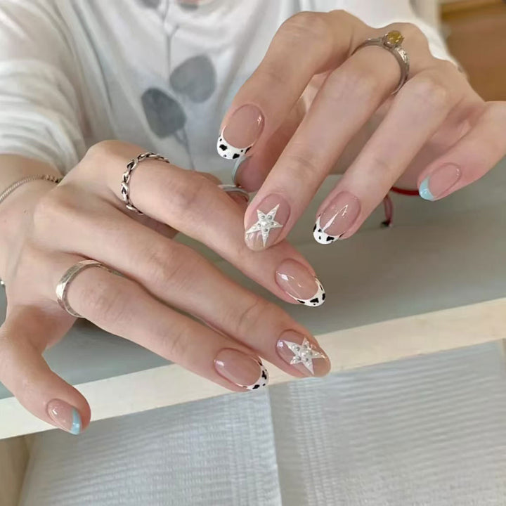 Artistic Seasonal Star-Design Nail Art