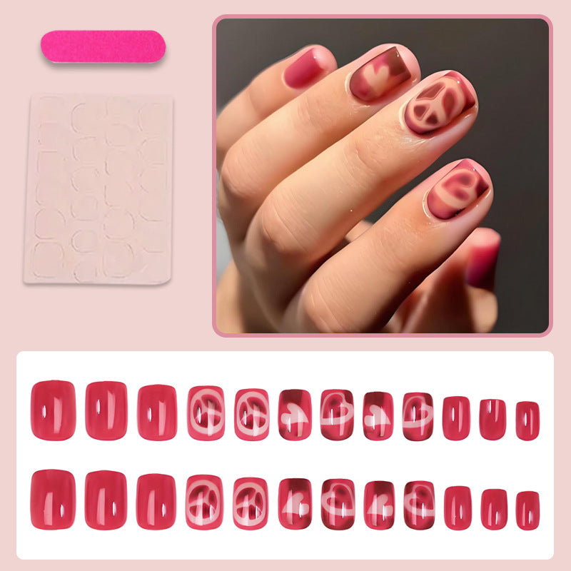 Acrylic nail set with elegant heart and pattern designs Kalsten