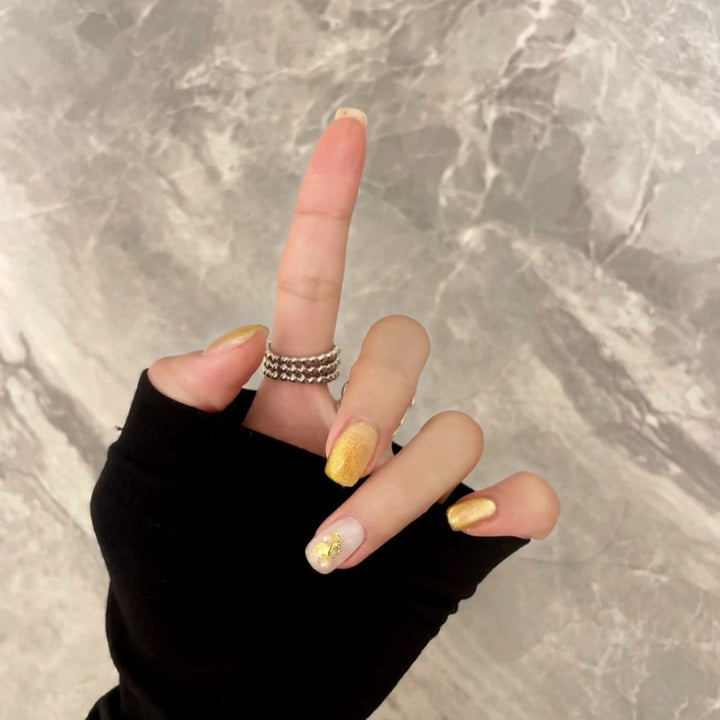 Elegant Press-On Nail Art Set with Gold Accents