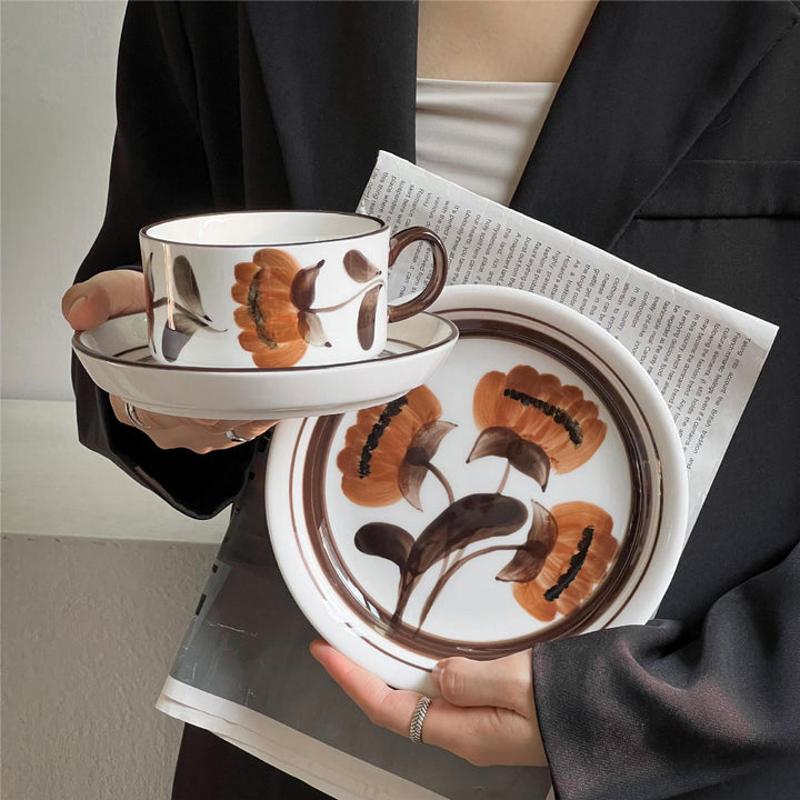 Porcelain cappuccino set with botanical brush painting and elegant rim decoration