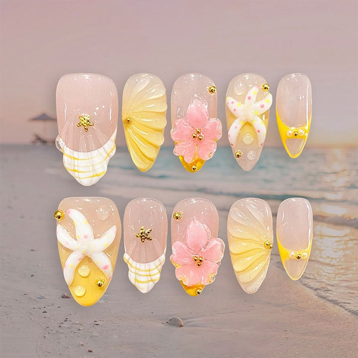 Artificial nail set with glamorous floral designs and creative glitter accents Kalsten