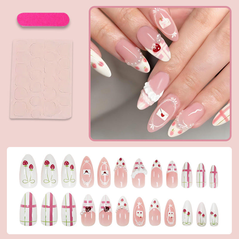 Artificial nail set with playful flowers and elaborate decorations Kalsten