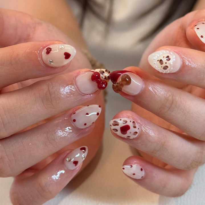 Artificial nail art with playful dots and bows Kalsten