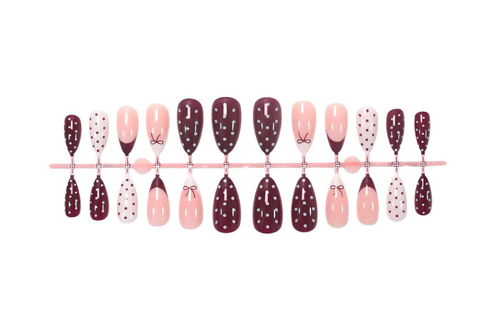 Artificial nail set with elegant bow and dot motifs Kalsten