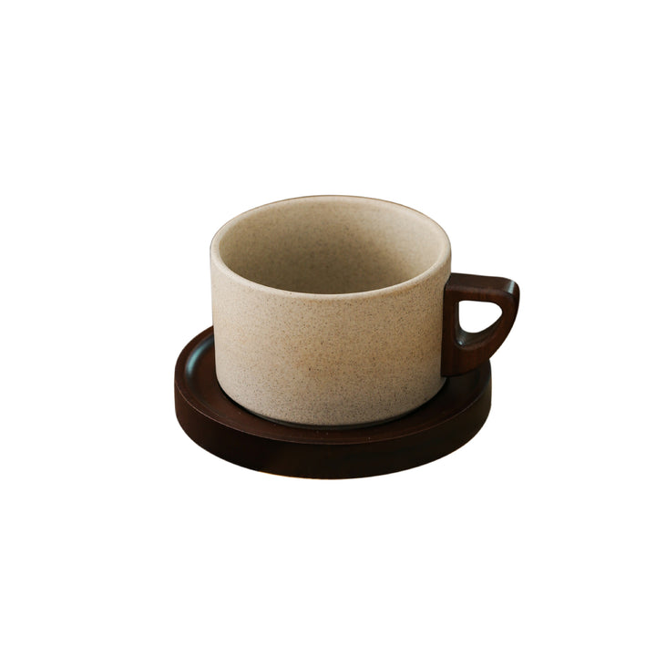 Ceramic mug with wooden handle and saucer