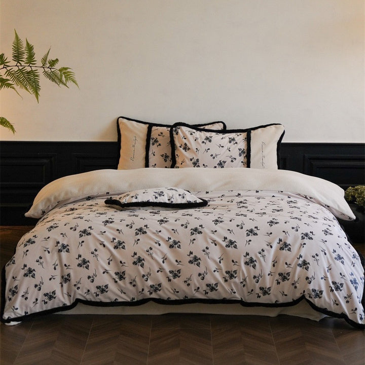 Premium cotton satin duvet cover with floral minimal embroidery and cozy sherpa edge