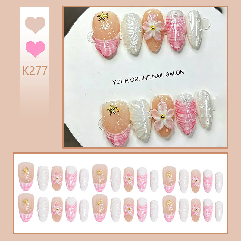 Artificial nail set with floral accents and glitter decorations Kalsten