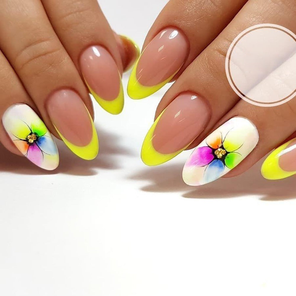 Artificial nails with colorful floral designs and striking color accents Kalsten